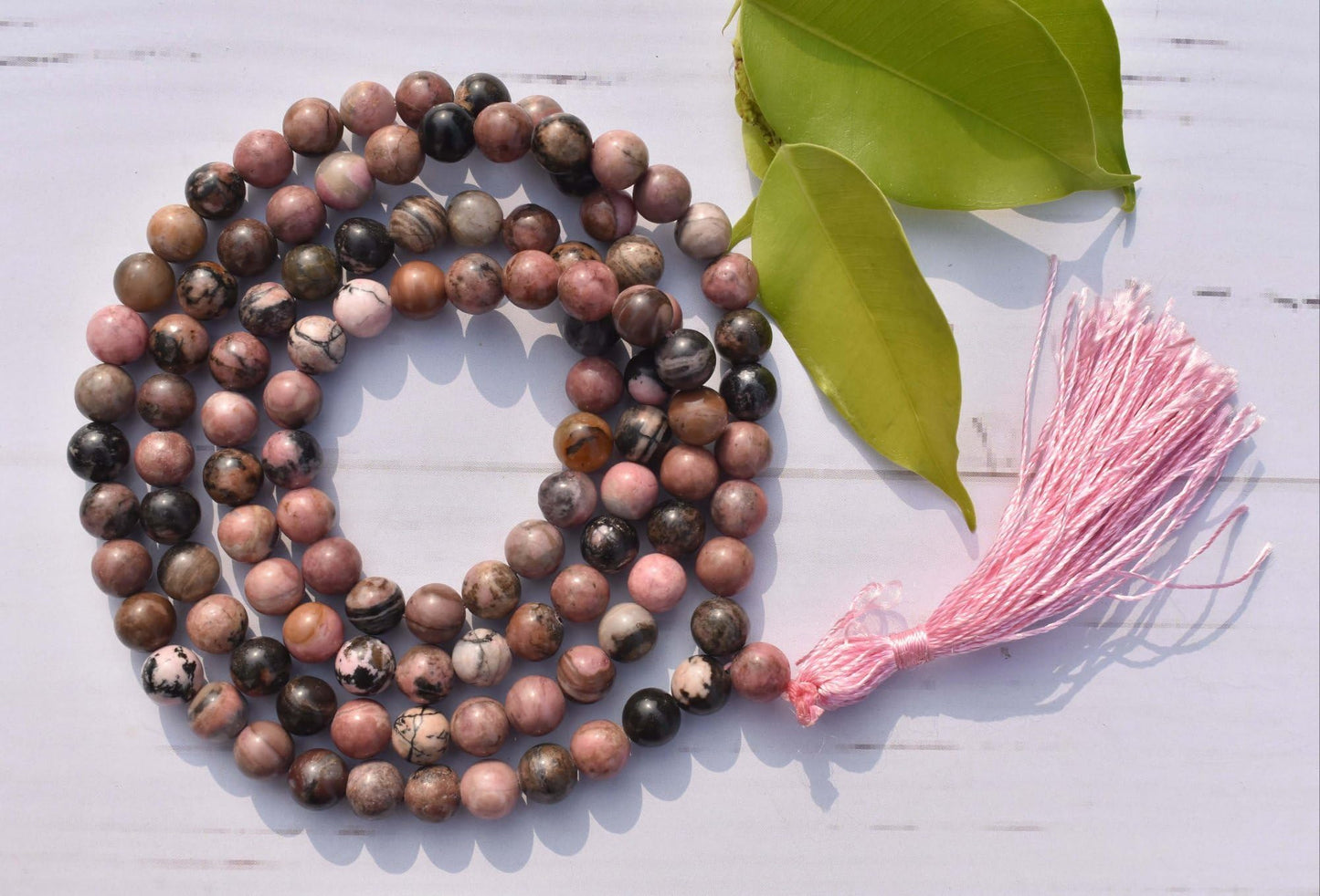 Divinity Crystals Pink Rhodonite Mala Beads - Certified Jaap Mala Collection for Men and Women, Natural Pure 8 mm Beads for Yoga, Reiki, Meditation, Feng Shui