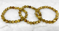 Divinity Crystals Cat's Eye Yellow Bracelet - Unisex 8mm Round Beads, Stretchable, 2.5 Inch Diameter